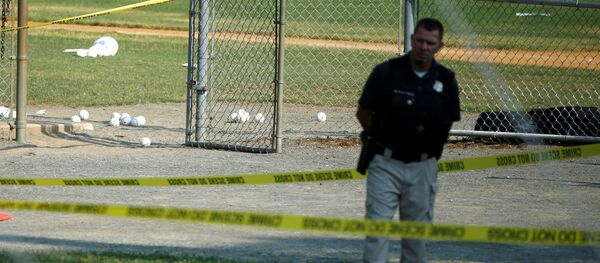 A police officer mans a shooting scene after a gunman opened fire on Republican members of Congress during a baseball practice near Washington in Alexandria, Virginia, June 14, 2017 A police officer mans a shooting scene after a gunman opened fire on Republican members of Congress during a baseball practice near Washington in Alexandria, Virginia, June 14, 2017 - Sputnik International