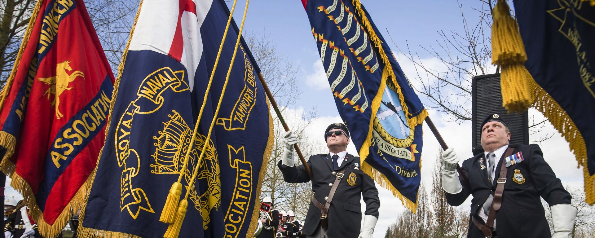 Military colours are displayed during a service marking the 35th anniversary of the Argentine invasion of the Falklands, at the National Memorial Arboretum in Staffordshire, England, Sunday April 2, 2017.  - Sputnik International, 1920, 08.02.2022