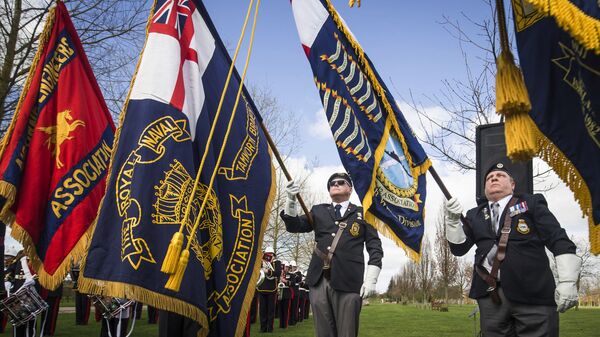 Military colours are displayed during a service marking the 35th anniversary of the Argentine invasion of the Falklands, at the National Memorial Arboretum in Staffordshire, England, Sunday April 2, 2017. - Sputnik International