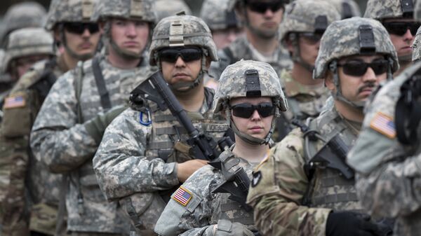 U.S. soldiers attend an opening ceremony of military exercise 'Iron Wolf 2017', at the training range in Pabrade, north of the capital Vilnius, Lithuania on Monday, June 12, 2017 - Sputnik International