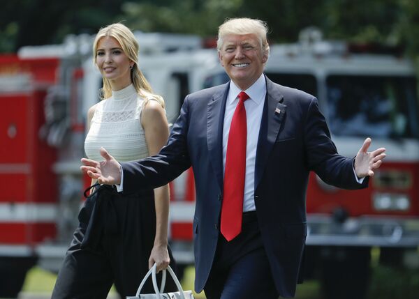 President Donald Trump gestures as he walks with his daughter Ivanka Trump across the South Lawn of the White House in Washington - Sputnik International