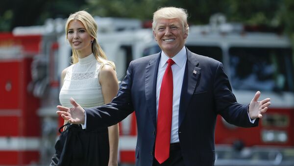 President Donald Trump gestures as he walks with his daughter Ivanka Trump across the South Lawn of the White House in Washingto - Sputnik International