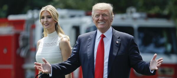 President Donald Trump gestures as he walks with his daughter Ivanka Trump across the South Lawn of the White House in Washington - Sputnik International