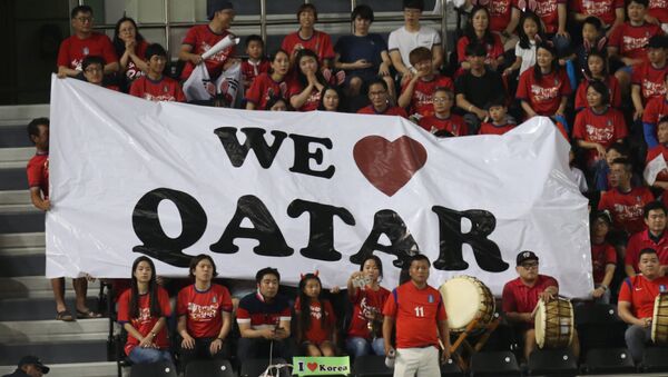 Football Soccer - Qatar v South Korea - World Cup 2018 Qualifiers - Doha, Qatar - 13/6/17- Fans watch the match. - Sputnik International