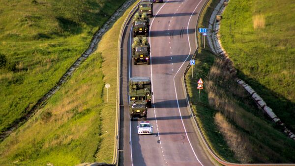 S-300 Favorite surface-to-air missile systems battalion during a march conducted as part of a bilateral drill involving air defense and aviation forces of the Western Military District - Sputnik International