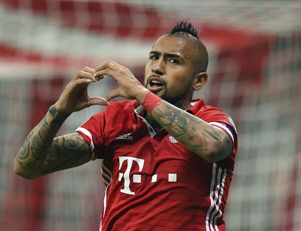 Munich's Arturo Vidal celebrates the opening goal during the Champions League quarterfinal first leg soccer match between FC Bayern Munich and Real Madrid, in Munich, Germany Munich's Arturo Vidal celebrates the opening goal during the Champions League quarterfinal first leg soccer match between FC Bayern Munich and Real Madrid, in Munich, Germany - Sputnik International