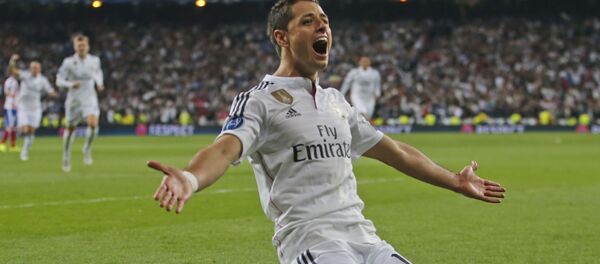 Real Madrid's Chicharito celebrates scoring his side's first goal during the second leg quarterfinal Champions League soccer match between Real Madrid and Atletico Madrid at Santiago Bernabeu stadium in Madrid, Spain - Sputnik International