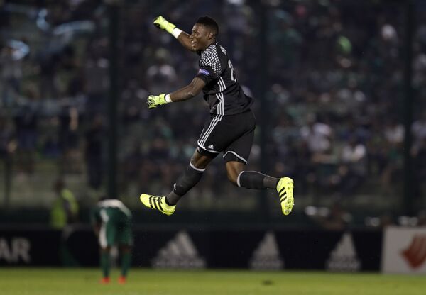 Ajax's Bertrand goalkeeper Andre Onana celebrates the goal of his team during the Europa League Group G soccer match between Panathinaikos and Ajax at Apostolos Nikolaidis stadium in Athens Ajax's Bertrand goalkeeper Andre Onana celebrates the goal of his team during the Europa League Group G soccer match between Panathinaikos and Ajax at Apostolos Nikolaidis stadium in Athens - Sputnik International