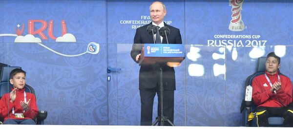 Russian President Vladimir Putin speaks at the St. Petersburg Arena ahead of the 2017 Confederations Cup opening match between the national teams of Russia and New Zealand - Sputnik International