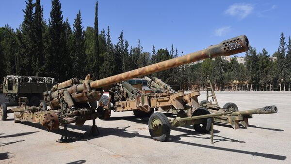 Weapons that need to be repaired at the artillery weapon, mortar and small arms repair works in Hama province, Syria - Sputnik International