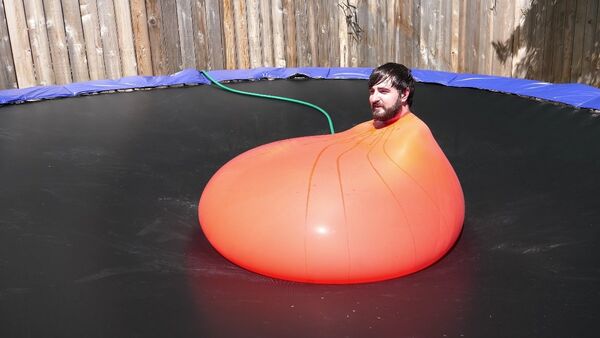 Submerged inside a 6ft Water Balloon - The Slow Mo Guys 4K - Sputnik International