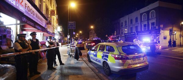 Police man a cordon at Finsbury Park where a vehicle struck pedestrians in London Monday, June 19, 2017. Police say a vehicle struck pedestrians on a road in north London, leaving several casualties and one person has been arrested. Police man a cordon at Finsbury Park where a vehicle struck pedestrians in London Monday, June 19, 2017. Police say a vehicle struck pedestrians on a road in north London, leaving several casualties and one person has been arrested. - Sputnik International