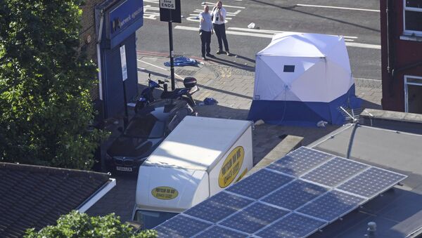 A forensic tent stands next to a van at Finsbury Park in north London after the vehicle struck pedestrians - Sputnik International