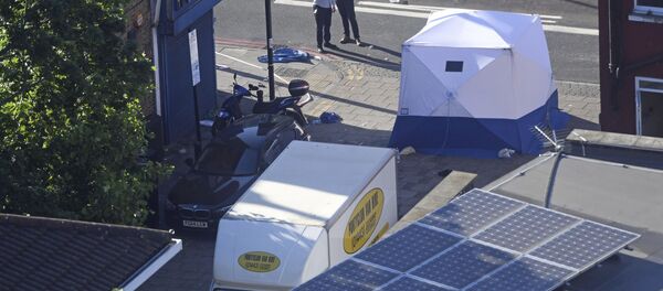 A forensic tent stands next to a van at Finsbury Park in north London after the vehicle struck pedestrians - Sputnik International