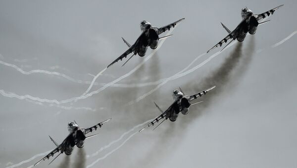 MiG-29 multipurpose fighter aircraft of the Swifts aerobatic team participate in an airshow at the Kubinka air base during the international military-technical forum ARMY-2016. (File) - Sputnik International