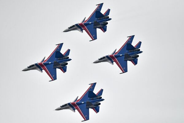 Su-30SM multipurpose fighter jets of the Russian Knights aerobatic display team during a rehearsal of the Victory Day parade air show Su-30SM multipurpose fighter jets of the Russian Knights aerobatic display team during a rehearsal of the Victory Day parade air show - Sputnik International