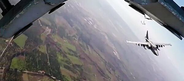 Russia's Su-25 aircraft take off from Hmeimim airbase escorted by Syria's MiG-29 fighter jets. (File) Russia's Su-25 aircraft take off from Hmeimim airbase escorted by Syria's MiG-29 fighter jets. (File) - Sputnik International