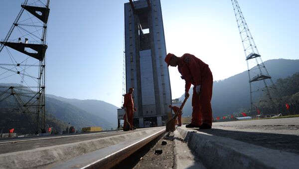 Chinese workers make final preparations to the launch pad at the Xichang Satellite Launch Centre in the southwestern province of Sichuan. (File) - Sputnik International