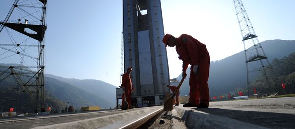Chinese workers make final preparations to the launch pad at the Xichang Satellite Launch Centre in the southwestern province of Sichuan. (File) Chinese workers make final preparations to the launch pad at the Xichang Satellite Launch Centre in the southwestern province of Sichuan. (File) - Sputnik International