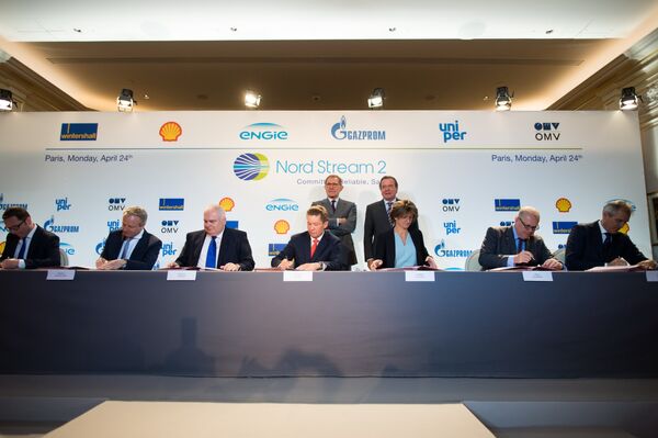 Officials from Wintershall Holding GmbH, Shell, Nord Stream 2 AG, Gazprom, ENGIE SA, Uniper SE and OMV AG signing the financing agreement for the Nord Stream 2 pipeline project. Officials from Wintershall Holding GmbH, Shell, Nord Stream 2 AG, Gazprom, ENGIE SA, Uniper SE and OMV AG signing the financing agreement for the Nord Stream 2 pipeline project. - Sputnik International