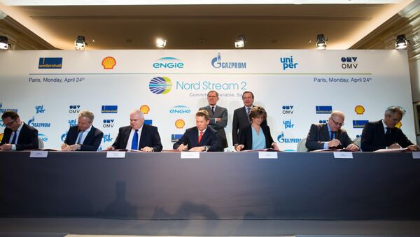 Officials from Wintershall Holding GmbH, Shell, Nord Stream 2 AG, Gazprom, ENGIE SA, Uniper SE and OMV AG signing the financing agreement for the Nord Stream 2 pipeline project. - Sputnik International