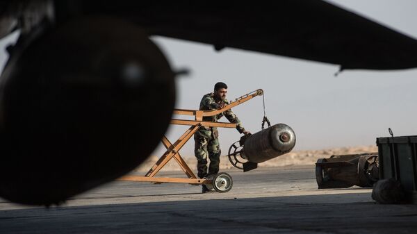 A Syrian army soldier prepares the Su-22 fighter jet for a flight at the Syrian Air Force base in Homs province. File photo - Sputnik International