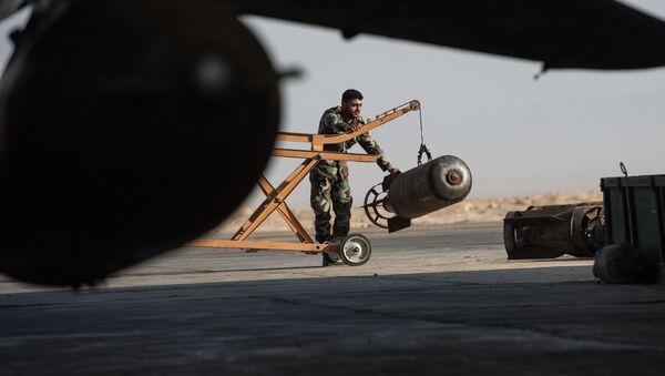 A Syrian army soldier prepares the Su-22 fighter jet for a flight at the Syrian Air Force base in Homs province. File photo - Sputnik International