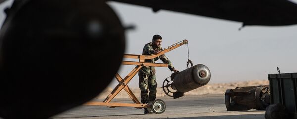 A Syrian army soldier prepares the Su-22 fighter jet for a flight at the Syrian Air Force base in Homs province. File photo A Syrian army soldier prepares the Su-22 fighter jet for a flight at the Syrian Air Force base in Homs province. File photo - Sputnik International