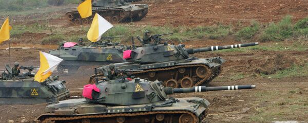 Taiwanese military maneuver U.S.-made M60 battle tanks during the annual Han Kuang military exercises in Hsinchu, northwestern Taiwan (File) - Sputnik International