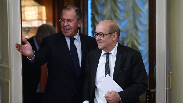 Russian Foreign Minister Sergey Lavrov, left, and Jean-Yves Le Drian, French Minister for Europe and Foreign Affairs, during a meeting at the Russian Foreign Ministry's Reception House - Sputnik International