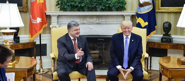 Ukrainian President Petro Poroshenko, left, and US President Donald Trump during their meeting. The image is a handout material courtesy of a third party. Editorial use only. Archiving, commercial use and advertising prohibited - Sputnik International