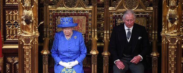 Britain's Queen Elizabeth and Prince Charles attend the State Opening of Parliament in central London, Britain June 21, 2017. - Sputnik International