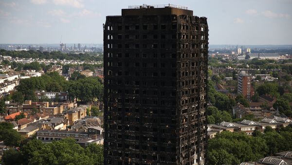 The burnt out remains of the Grenfell apartment tower are seen in North Kensington, London, Britain, June 18, 2017. - Sputnik International