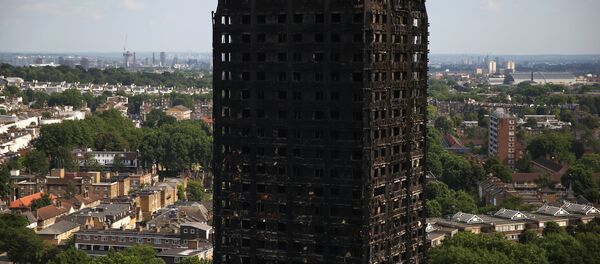 The burnt out remains of the Grenfell apartment tower are seen in North Kensington, London, Britain, June 18, 2017. - Sputnik International