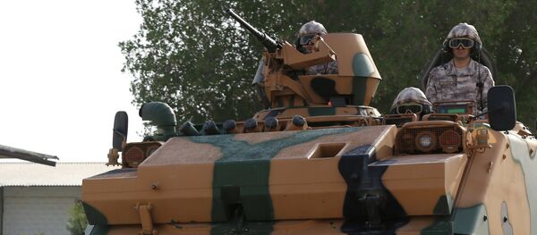 Turkish APC drives at their military base in Doha, Qatar June 18, 2017. Picture taken June 18, 2017 Turkish APC drives at their military base in Doha, Qatar June 18, 2017. Picture taken June 18, 2017 - Sputnik International
