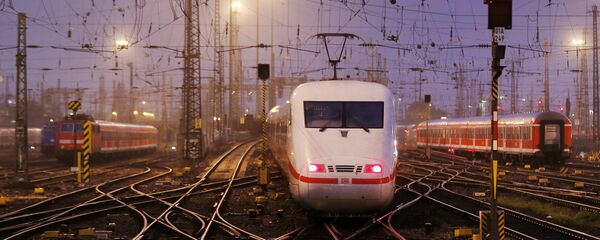 An out-of-service train approaches to a station during a strike by German train drivers to demand pay hike and better work conditions in Frankfurt, Germany, Saturday, Oct. 18, 2014 - Sputnik International
