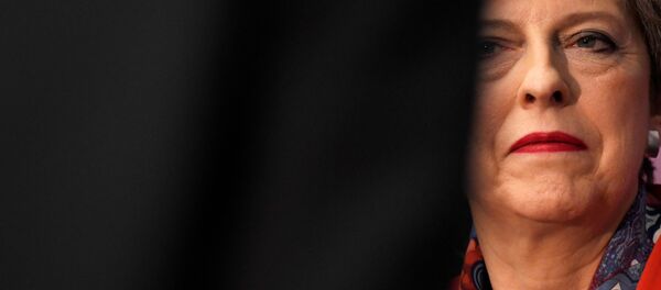 Britain's Prime Minister Theresa May waits to speak after retaining her seat at the count centre for the general election in Maidenhead, June 9, 2017. Britain's Prime Minister Theresa May waits to speak after retaining her seat at the count centre for the general election in Maidenhead, June 9, 2017. - Sputnik International