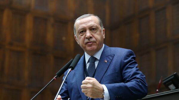Turkish President Tayyip Erdogan addresses members of parliament from his ruling AK Party (AKP) during a meeting at the Turkish parliament in Ankara, Turkey, June 13, 2017 - Sputnik International