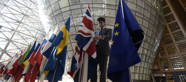 An organiser adjusts the British national flag on April 29, 2017, prior to the EU leaders summit at the Europa building, the main headquarters of European Council and the Council of the EU, in Brussels An organiser adjusts the British national flag on April 29, 2017, prior to the EU leaders summit at the Europa building, the main headquarters of European Council and the Council of the EU, in Brussels - Sputnik International