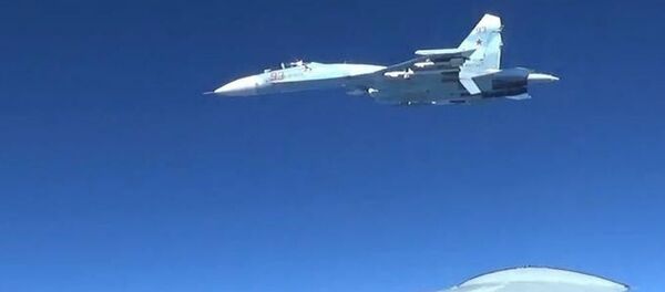 A U.S. RC-135U flying in international airspace over the Baltic Sea was intercepted by a Russian SU-27 Flanker June 19, 2017 - Sputnik International