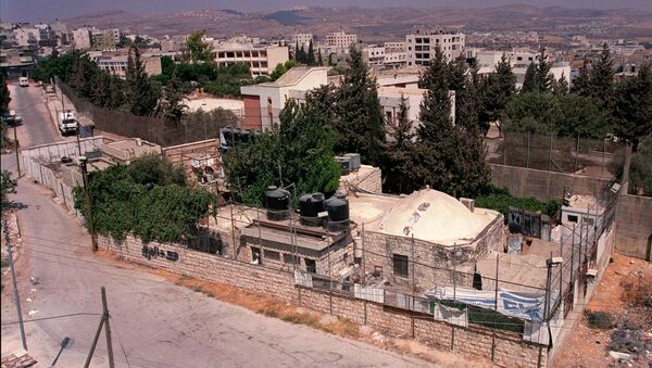 Joseph's Tomb compound is seen from a building in the West Bank city of Nablus. (File) - Sputnik International