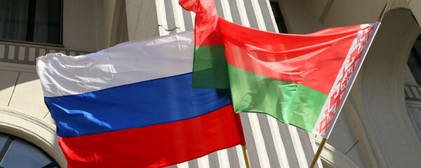 State colors of Russia and Belarus on the building of the Minsk Philharmonic. - Sputnik International