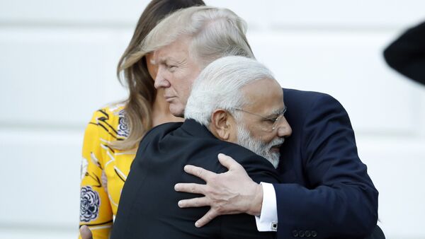 Indian Prime Minister Narendra Modi hugs President Donald Trump as Modi departs the White House, Monday, June 26, 2017, in Washington. - Sputnik International