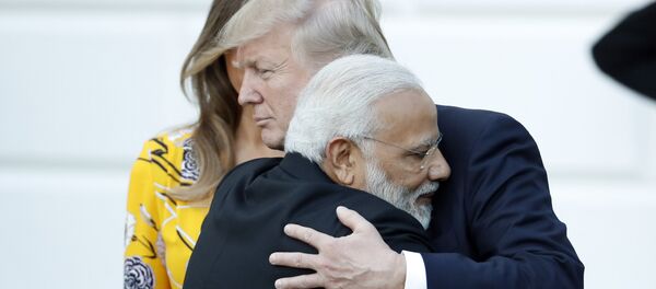 Indian Prime Minister Narendra Modi hugs President Donald Trump as Modi departs the White House, Monday, June 26, 2017, in Washington. Indian Prime Minister Narendra Modi hugs President Donald Trump as Modi departs the White House, Monday, June 26, 2017, in Washington. - Sputnik International
