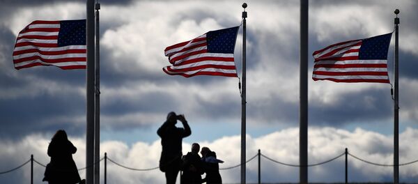 Tourists at the Washington Monument in Washington, D.C. Tourists at the Washington Monument in Washington, D.C. - Sputnik International