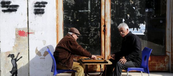 Men play backgammon in the Turkish Cypriots breakaway area at northern divided capital of Nicosia, Cyprus, Tuesday, Jan. 17, 2017. Men play backgammon in the Turkish Cypriots breakaway area at northern divided capital of Nicosia, Cyprus, Tuesday, Jan. 17, 2017. - Sputnik International