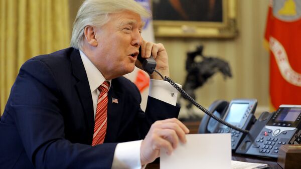 U.S. President Donald Trump congratulates Prime Minister Leo Varadkar of Ireland, during a phone call at the Oval Office of the White House in Washington, U.S., June 27, 2017 - Sputnik International