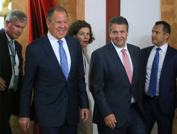 Foreground, from left: Russian Foreign Minister Sergei Lavrov and German Foreign Minister Sigmar Gabriel at the news conference in Krasnodar Foreground, from left: Russian Foreign Minister Sergei Lavrov and German Foreign Minister Sigmar Gabriel at the news conference in Krasnodar - Sputnik International