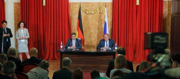 Russian Foreign Minister Sergei Lavrov and Foreign Minister of Germany Sigmar Gabriel, center, from right, at a news conference in Krasnodar Russian Foreign Minister Sergei Lavrov and Foreign Minister of Germany Sigmar Gabriel, center, from right, at a news conference in Krasnodar - Sputnik International