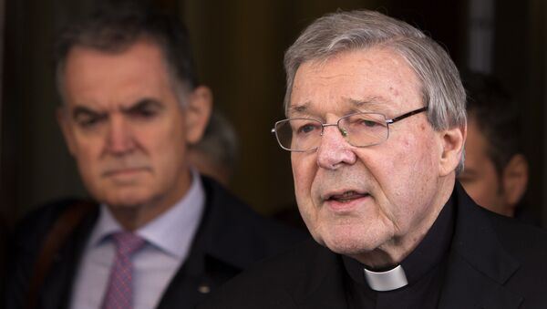 In this March 3, 2016 file photo, Australian cardinal George Pell reads a statement to reporters as he leaves the Quirinale hotel after meeting members of the Australian group of relatives and victims of priestly sex abuses, in Rome, Italy. - Sputnik International